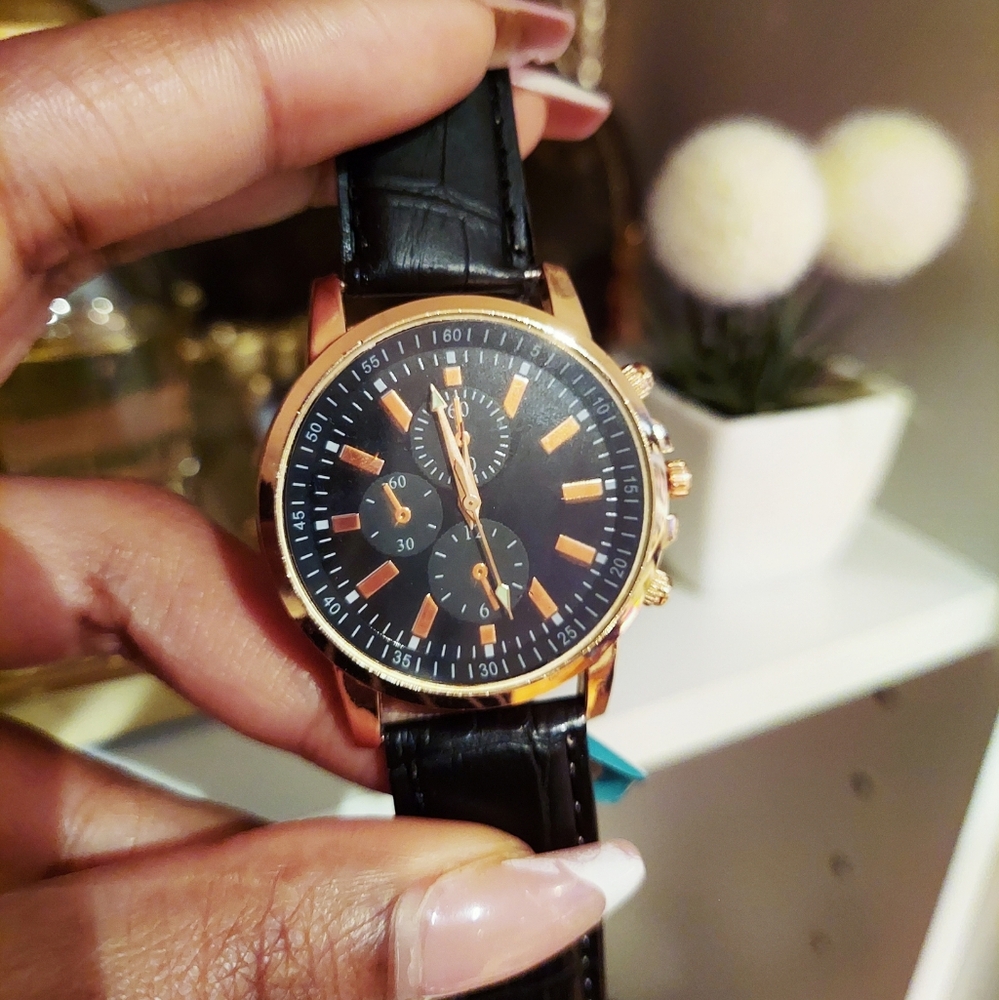 Black and rose gold watch